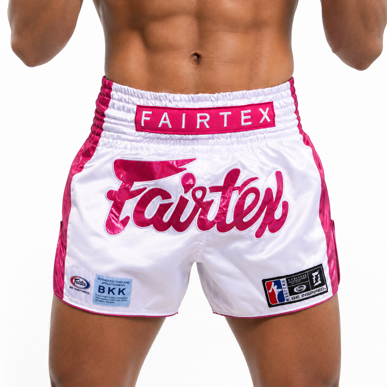 Fairtex Muay Thai Shorts Pink Strike in white and metallic pink satin with Fairtex logo